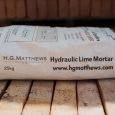 Bag of HG Matthews hydraulic lime mortar on a wooden pallent